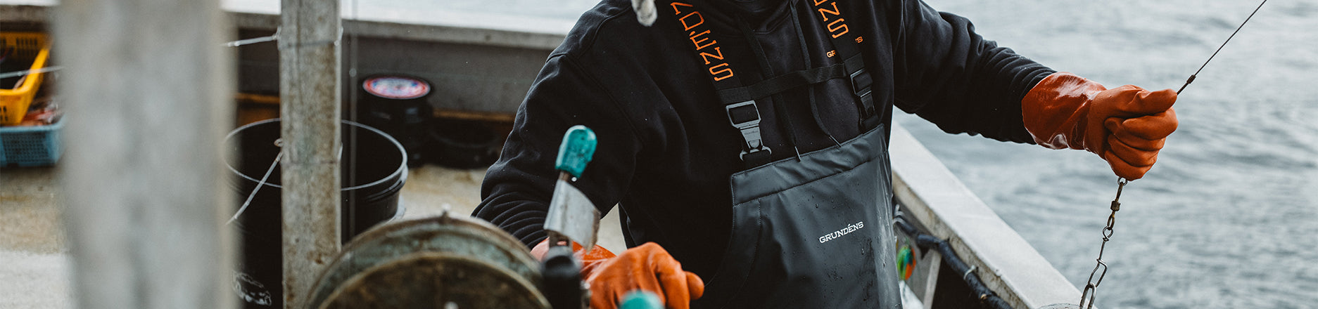 Commercial fisherman wearing the Grundens Neptune Pro Bibs