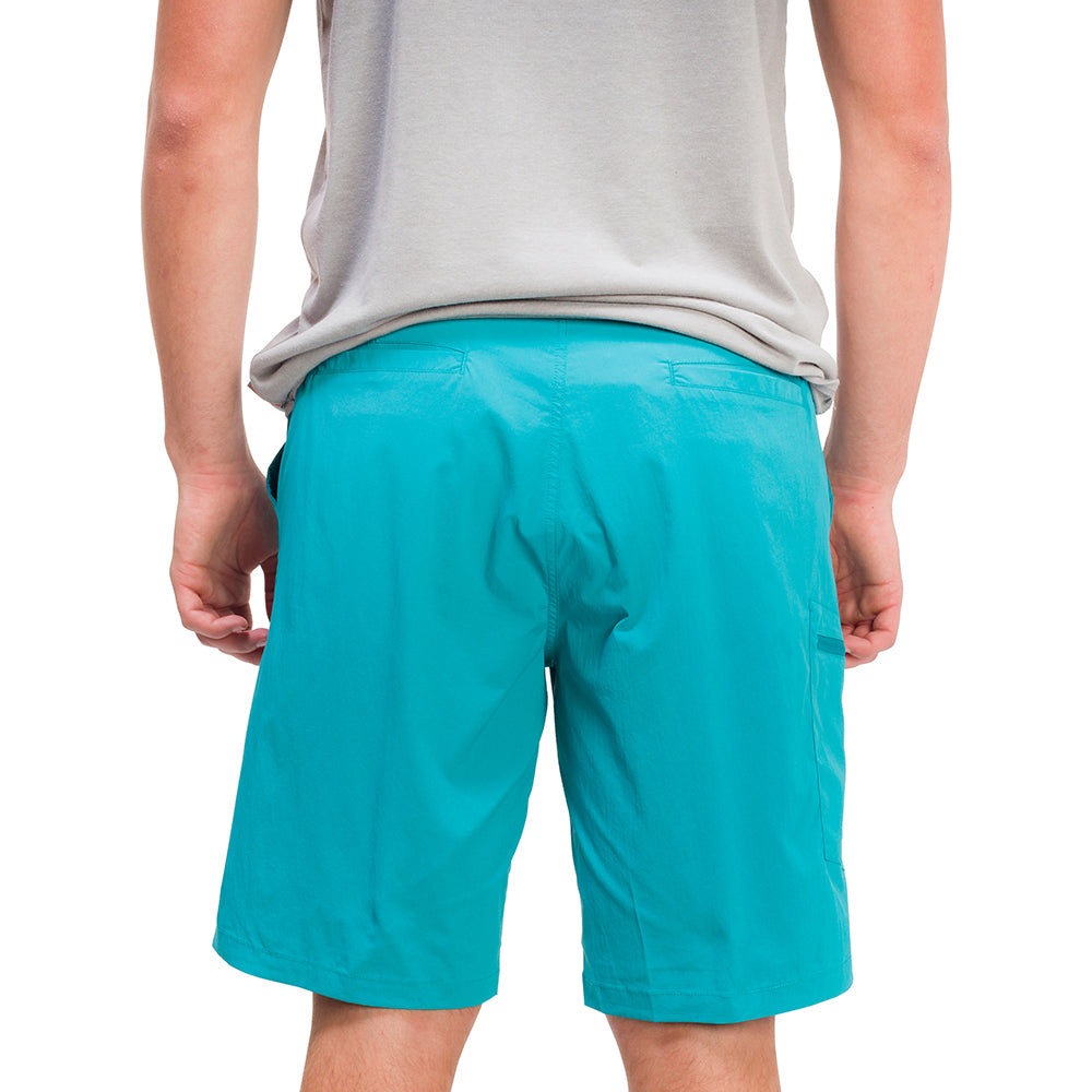 Men's turquoise shorts with a back pocket, worn with a gray shirt.