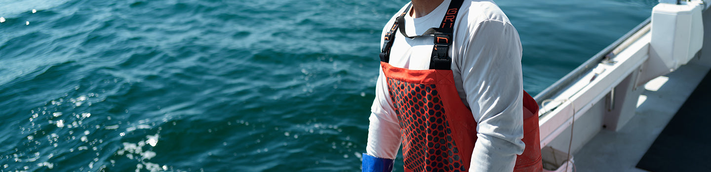 Commercial fisherman wearing the Grundens Neptune Pro Bibs