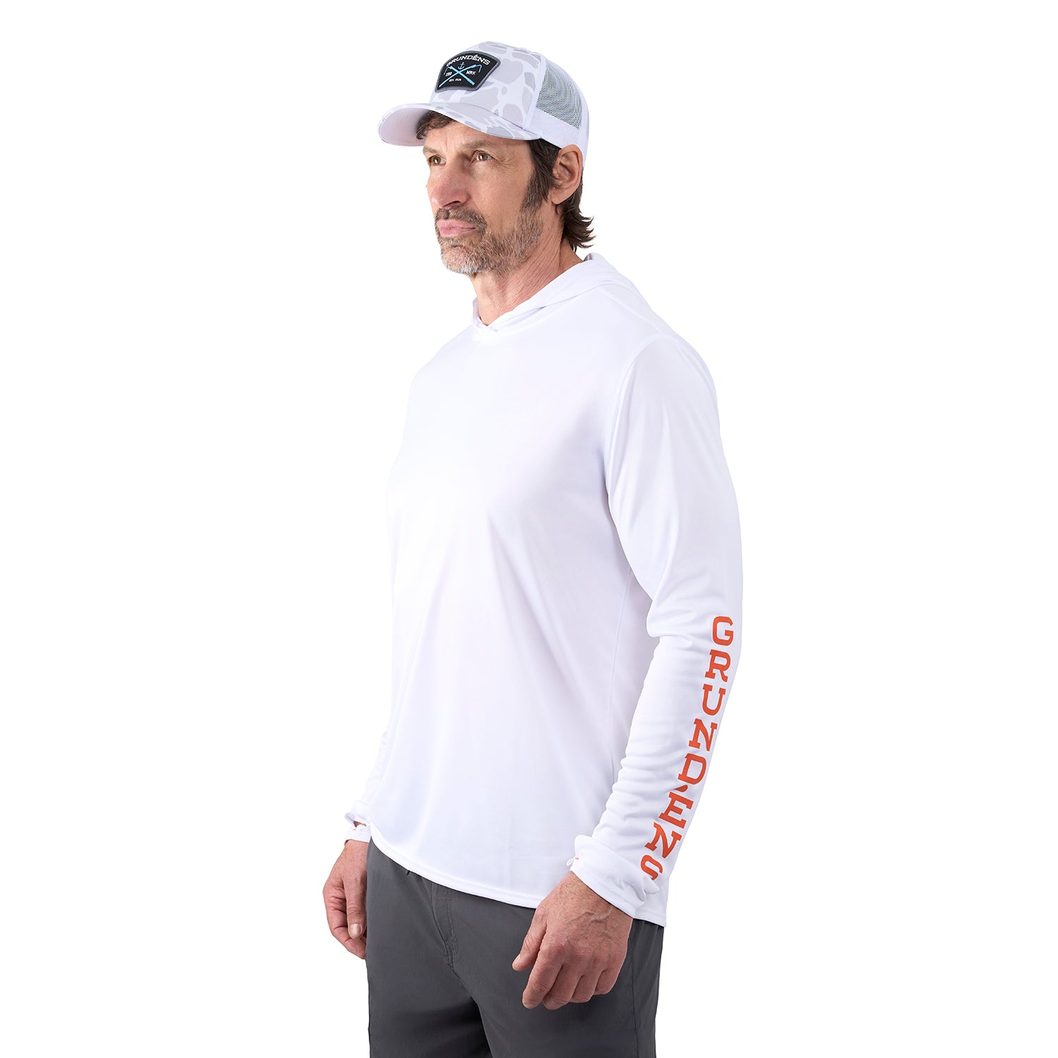 White long-sleeve hoodie with "GRUNDENS" printed in orange on the left sleeve, worn by a man with a cap.