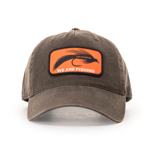 Brown trucker hat with an orange patch featuring the text "WE ARE FISHING" and a fish graphic.