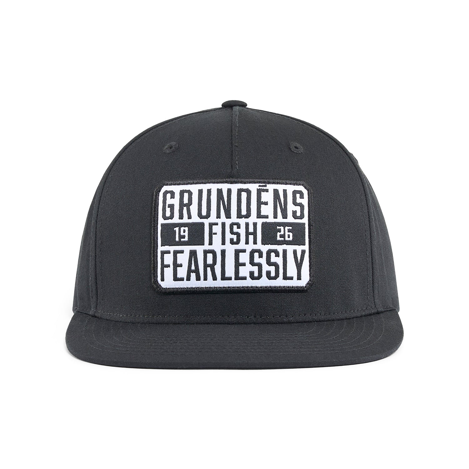Black trucker hat featuring a white patch with "GRUNDĒNS FISH FEARLESSLY" and the year "1926."