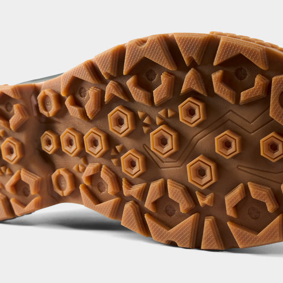 High-Grip Gum Rubber Outsole with Rubber Sidewall Wrap at High-Wear Areas Provides Excellent Traction & Durability 