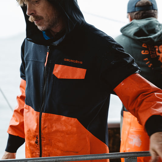 Stretch-Woven Upper for Added Mobility, Overlaid with PVC Reinforcement for Ruggedness and On-Deck Performance